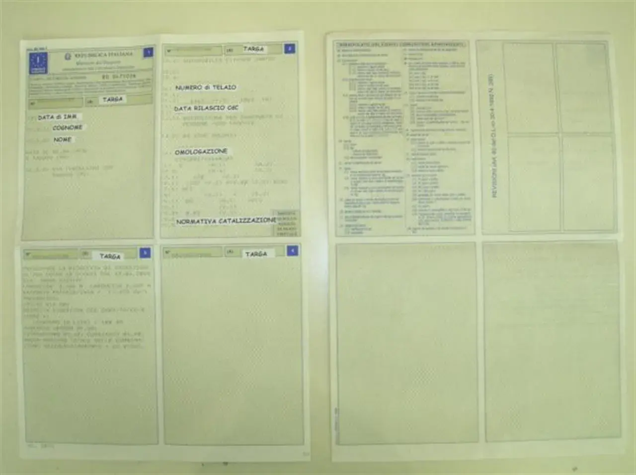 Italian vehicle registration documents with fields for chassis number, license plate, and homologation.