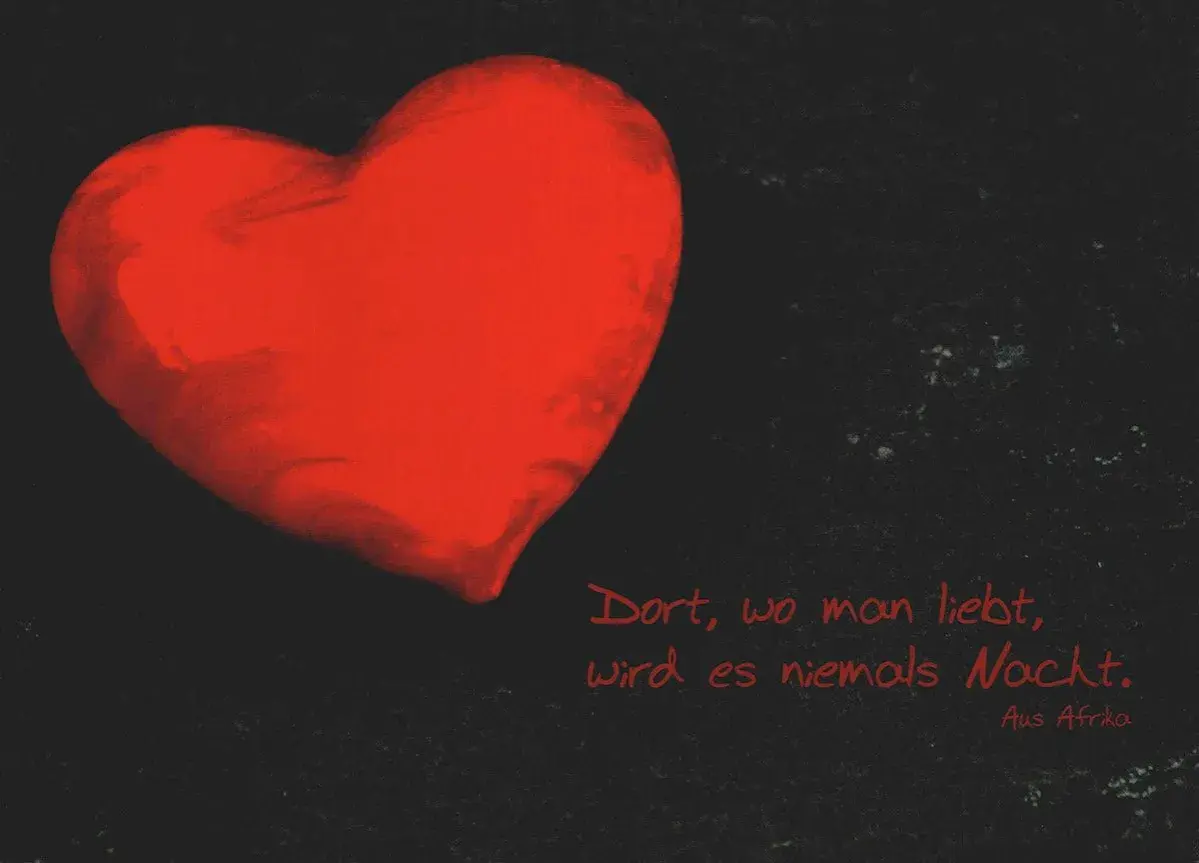 Ein leuchtend rotes Herz auf schwarzem Grund. "Dort, wo man liebt, wird es niemals Nacht." Ein Zitat, das zeigt, du hast ein großes Herz.