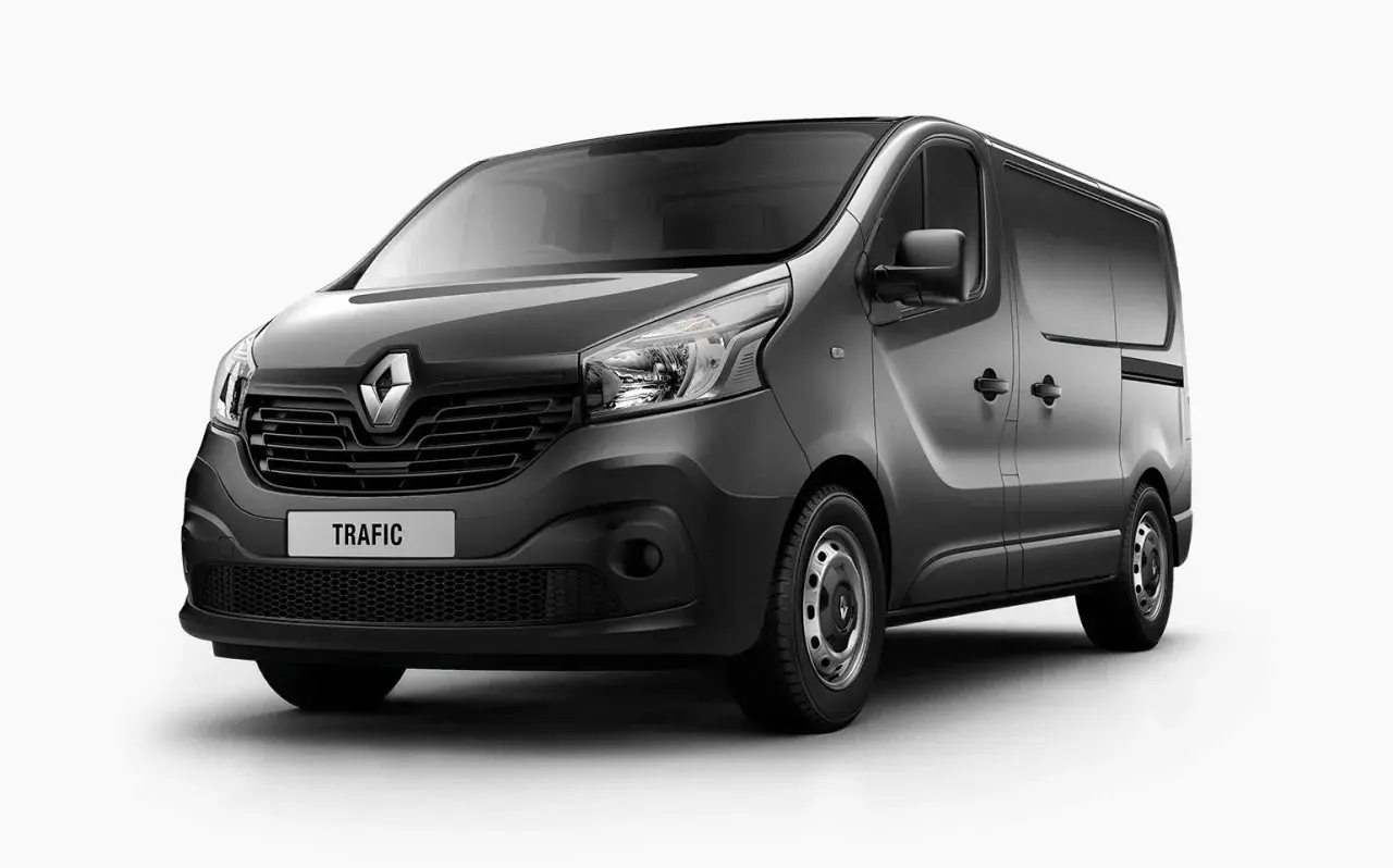 Szary van Renault Trafic 3 z napisem "TRAFIC" na grillu, gotowy do pracy.