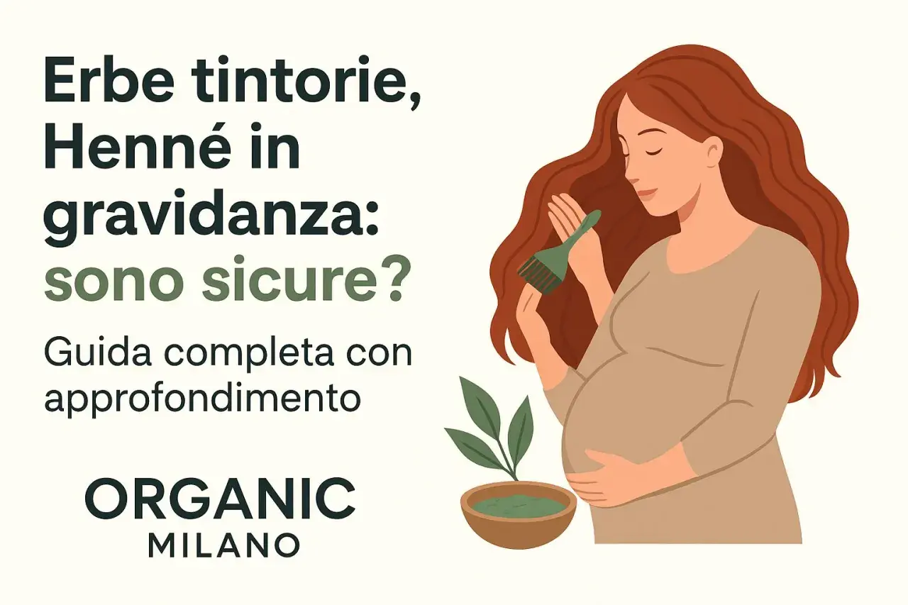 Donna incinta con capelli rossi e pennello per tinta, con ciotola di henné. Guida su erbe tintorie e gravidanza.