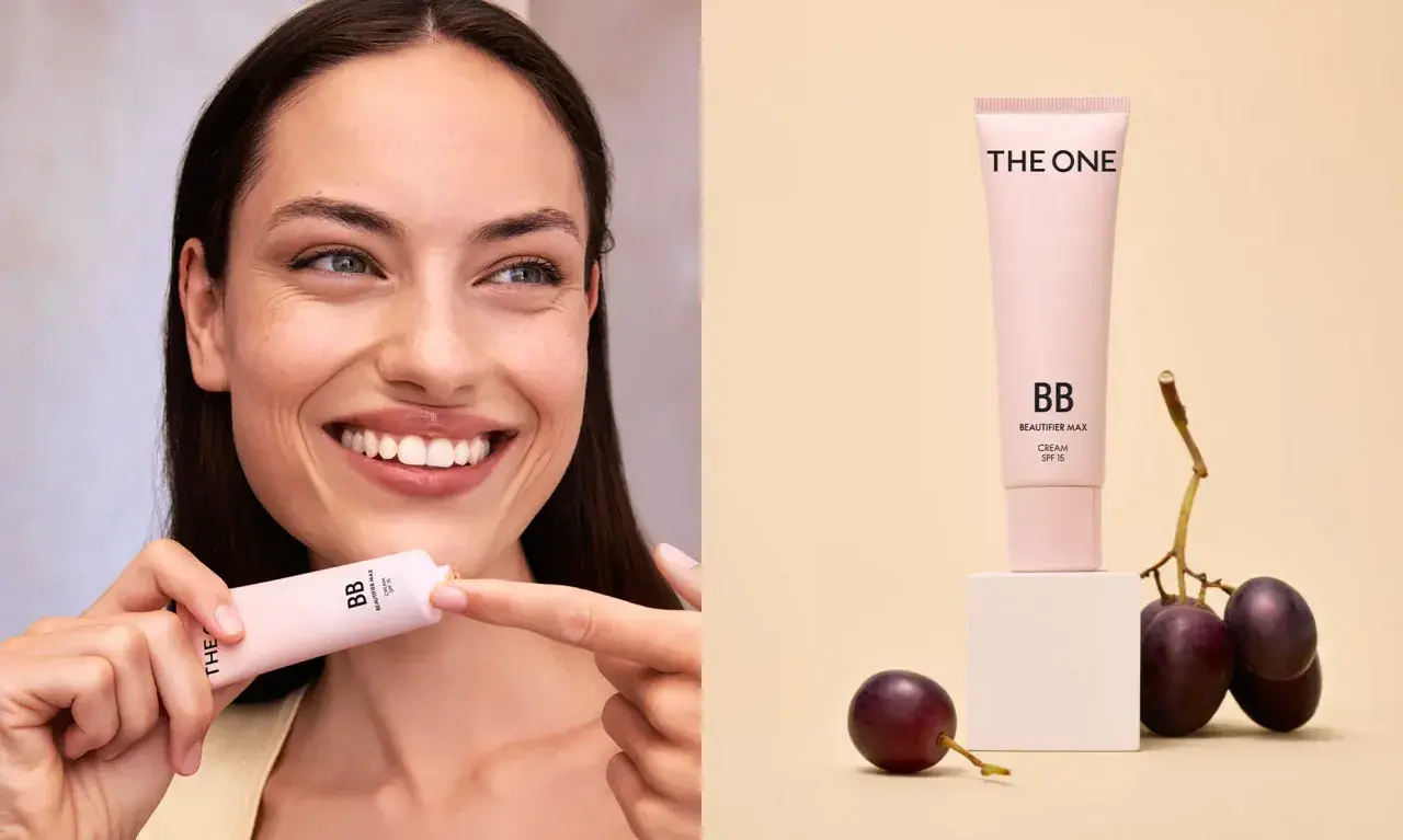 Glad kvinna med en tub BB cream. Jämförelse mellan bb cream vs cc cream.