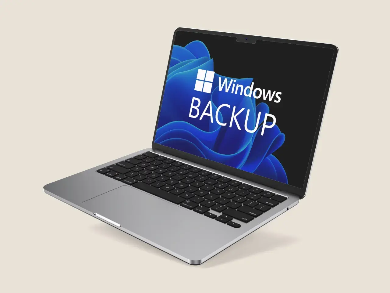 Ein Laptop mit dem Windows 11 Backup-Logo auf dem Bildschirm. Der Dateiversionsverlauf von Windows 11 sichert Ihre Daten.