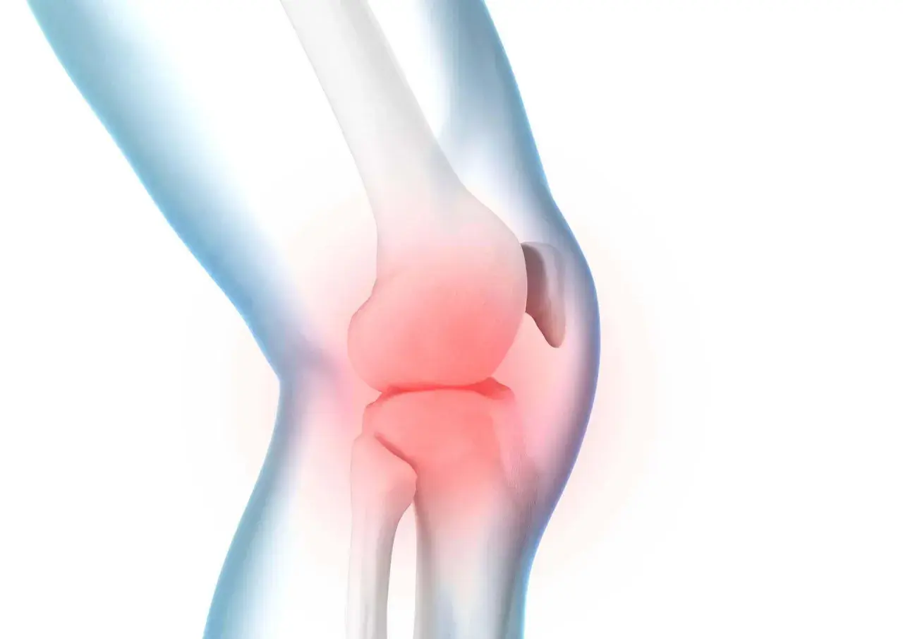 Illustration eines menschlichen Knies mit roter Hitze, die **Spannung im Knie** symbolisiert.