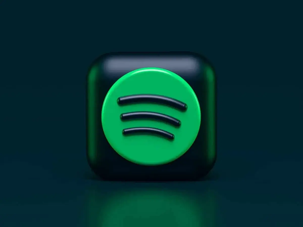 Ikona Spotify na ciemnym tle.