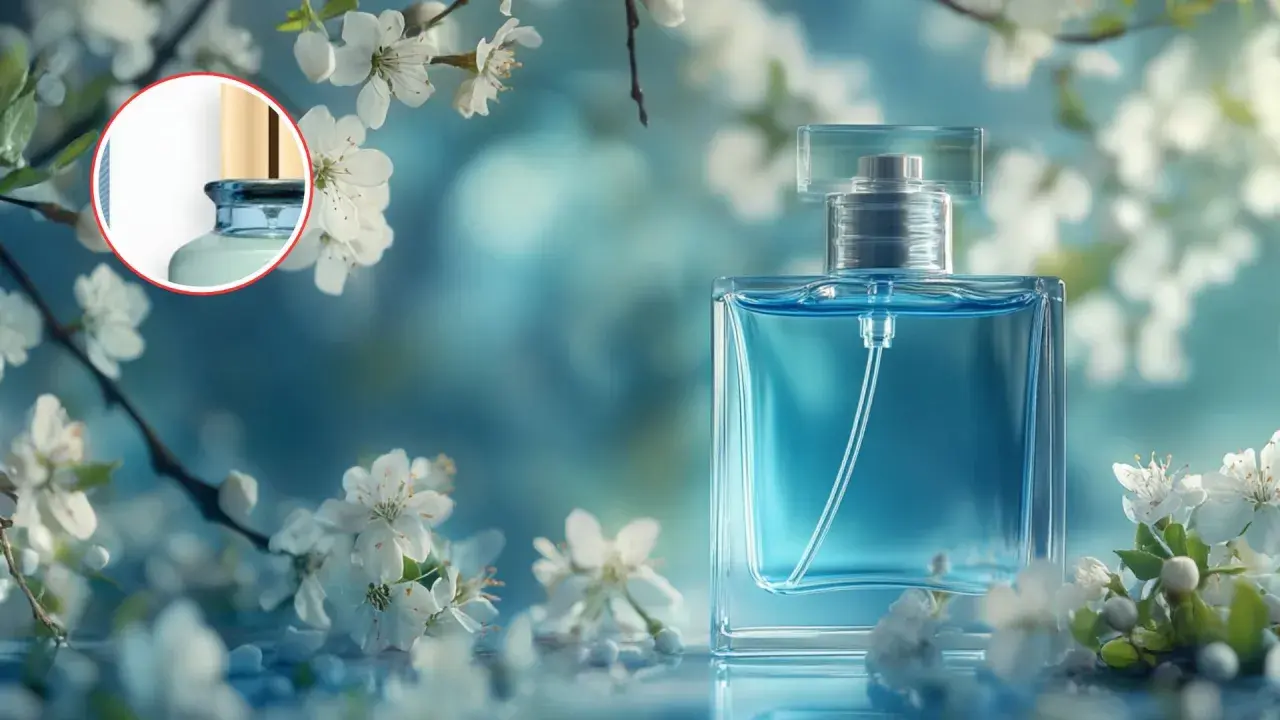 Frasco de perfume azul con un brillo refrescante, evocando la frescura de la naturaleza. Una posible equivalencia de Mercadona para un aroma cautivador.