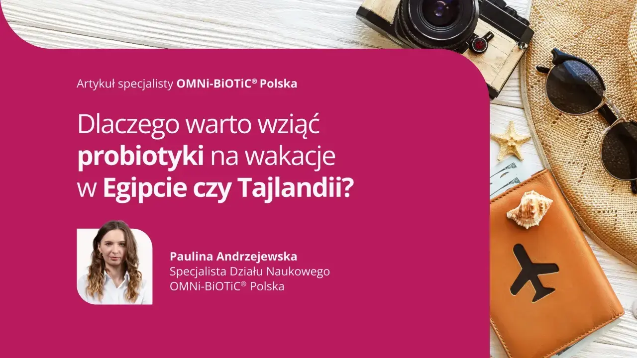 Artykuł o tym, dlaczego warto wziąć probiotyk do Tajlandii. Obok paszport, okulary i aparat fotograficzny.