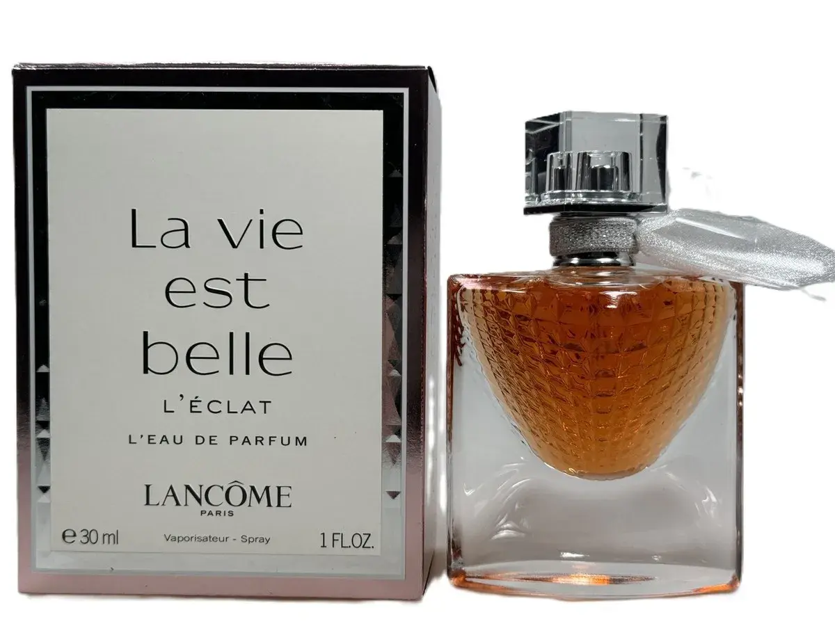 Elegancki flakon i pudełko perfum Lancôme La Vie Est Belle L'Éclat. Zapach, który rozświetla życie.
