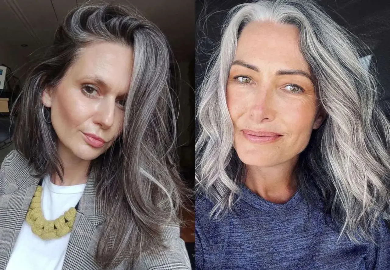 Dos mujeres lucen con orgullo sus mechas go grey, mostrando la belleza natural de su cabello plateado.