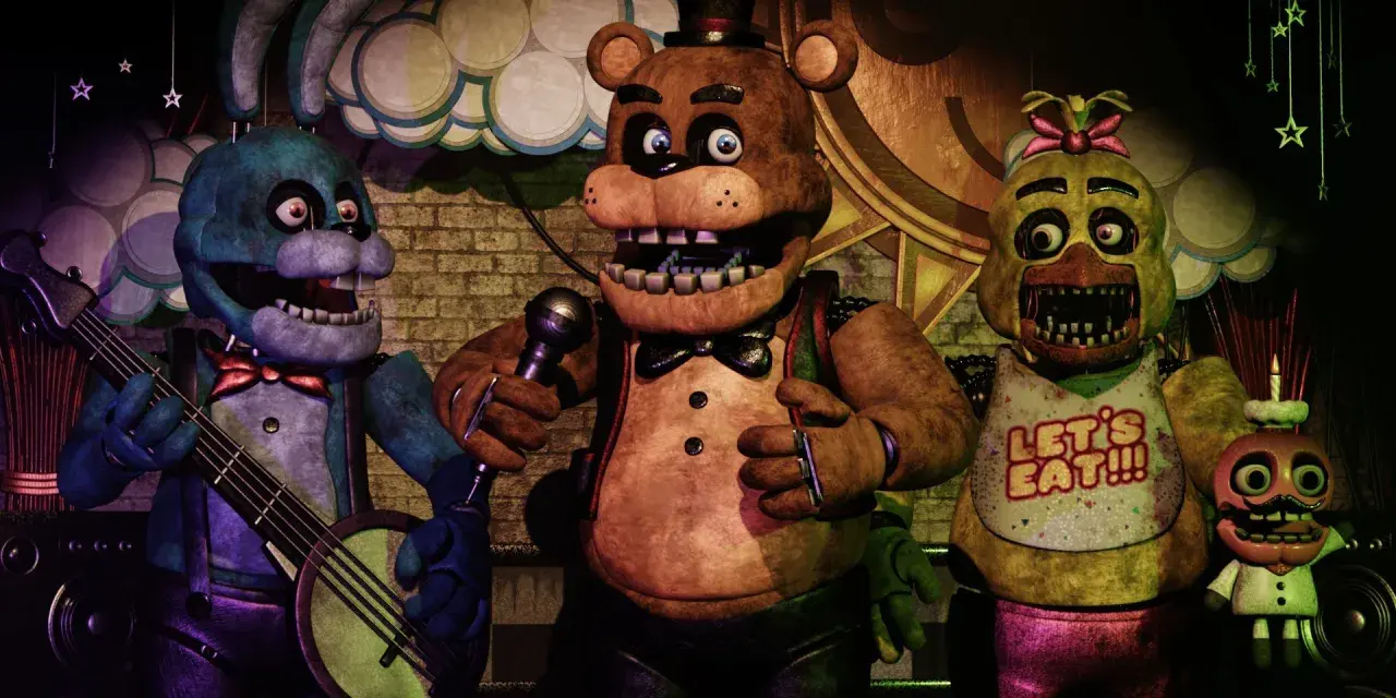 Freddy Fazbear, Bonnie i Chica z gry Five Nights at Freddy's (FNAF) na scenie. To właśnie co to jest FNAF – przerażająca gra o animatronikach.