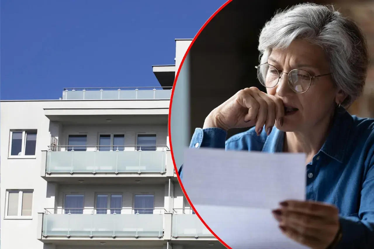 Zmartwiona kobieta czyta list przed nowoczesnym budynkiem, być może dotyczy to jej mieszkania TBS.