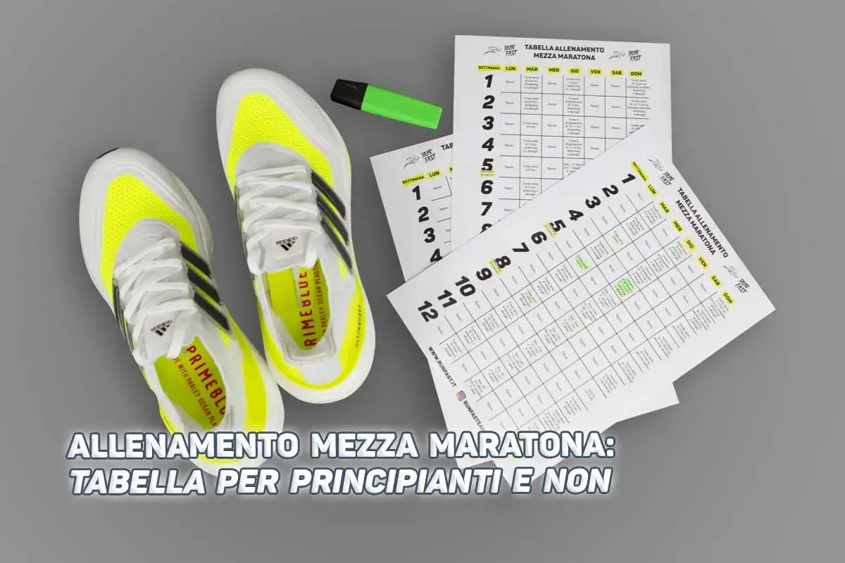 Scarpe da corsa e tabelle ripetute per allenamento mezza maratona, ideali per principianti.