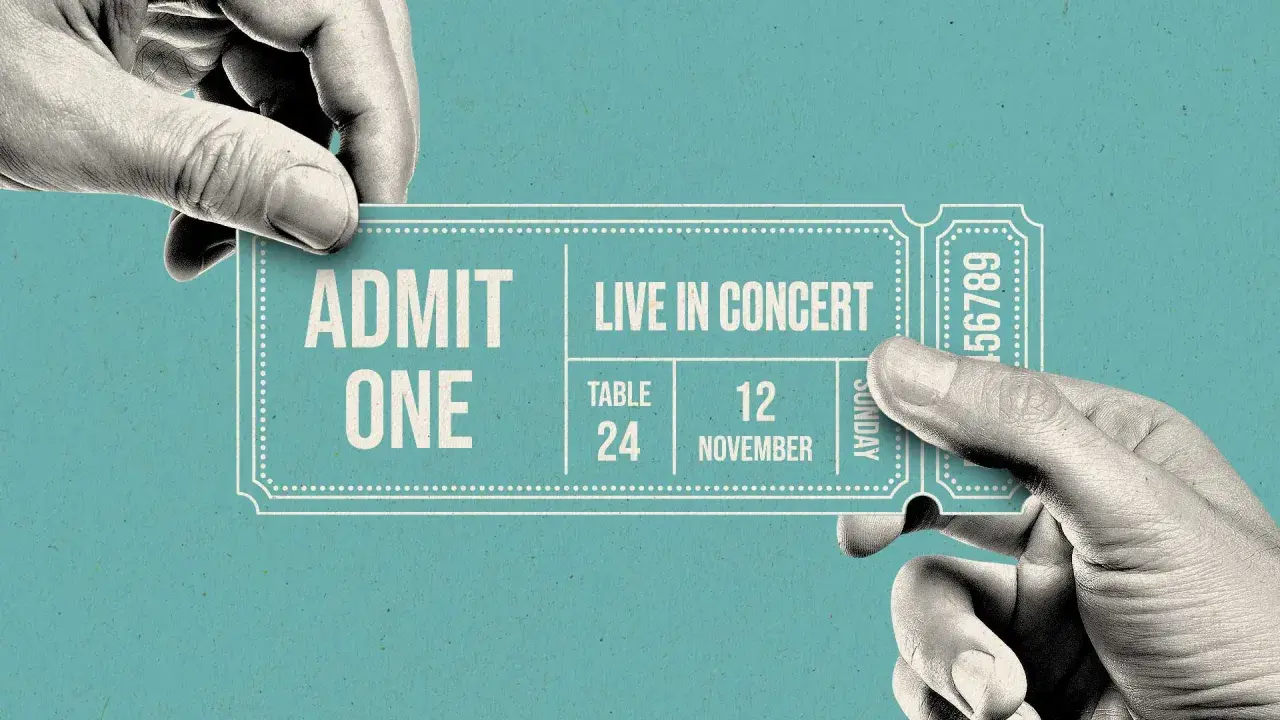 Hands exchange a concert ticket. A resale ticket means someone is selling their ticket to another person, often at a different price.