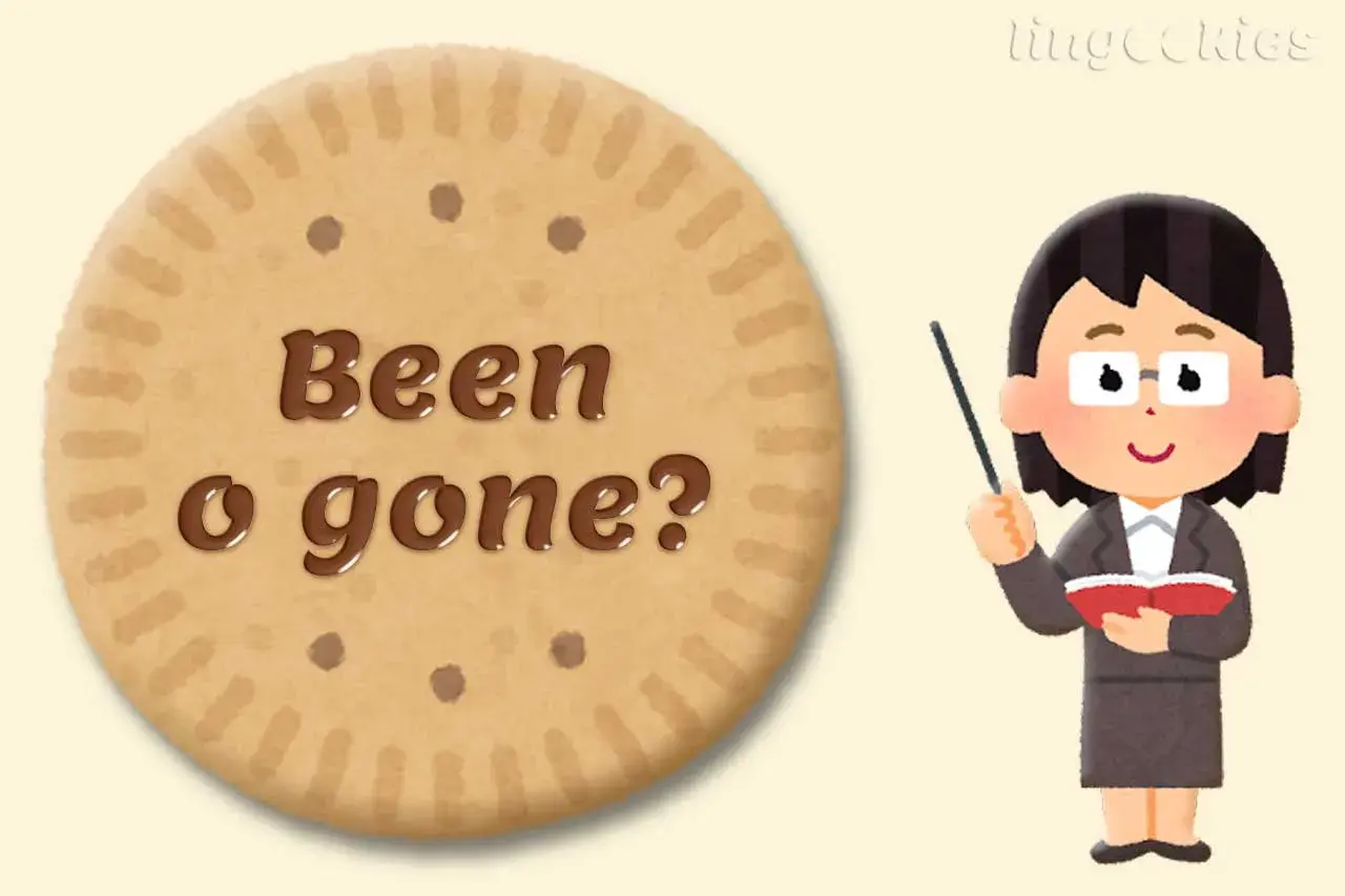 Biscotto con "Been o gone?" scritto in cioccolato, con una maestra che indica. Esempi di "been" e "gone" per imparare l'inglese.