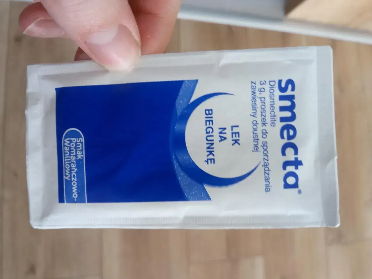 Saszetka leku Smecta dla psa, o smaku pomarańczowo-waniliowym, na biegunkę.