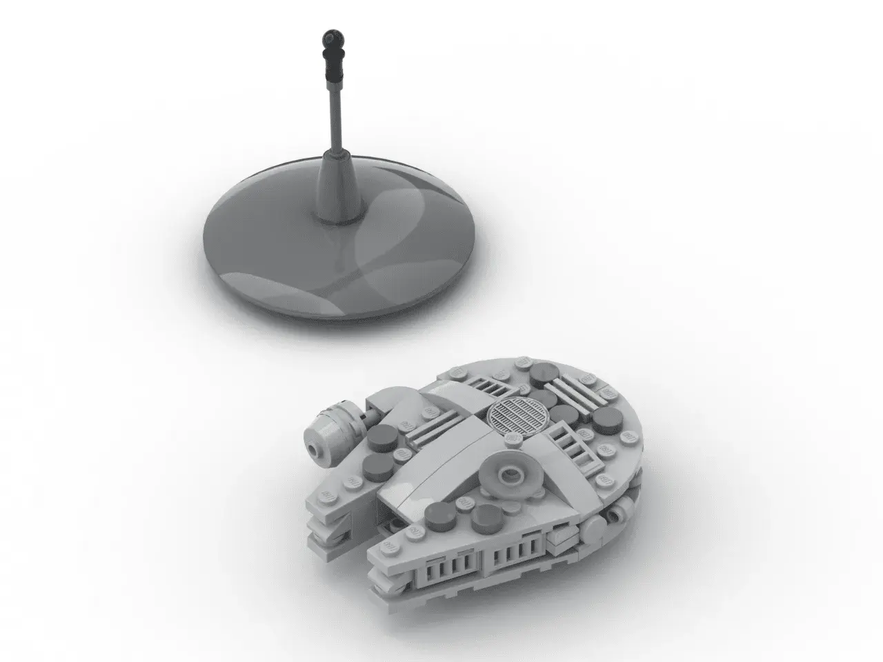 Grauer Lego Millennium Falcon auf weißem Grund, daneben ein Display-Ständer. Die Lego Millennium Falcon Anleitung ist hier zu sehen.