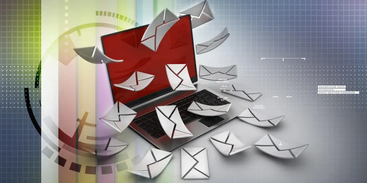 Un portátil rodeado de sobres digitales, como si se preguntara qué es Poe y cómo gestionar tantos correos.