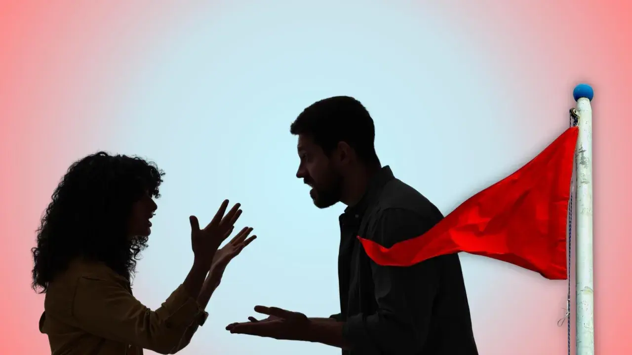 Coppia in silhouette che litiga, con una bandiera rossa che sventola, simbolo di un avvertimento.