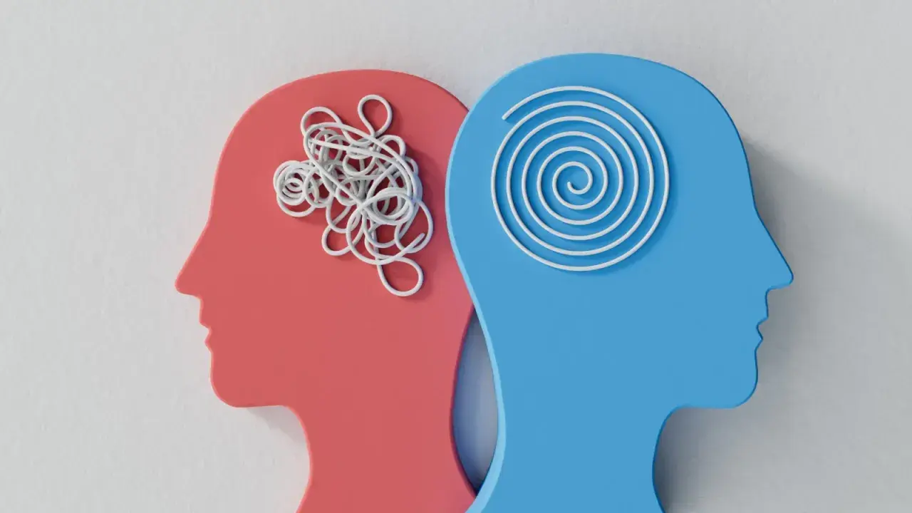 Zwei Kopfprofile: Rot mit chaotischem Garn, Blau mit Spirale. Ein Bild, um mental health verbessern.