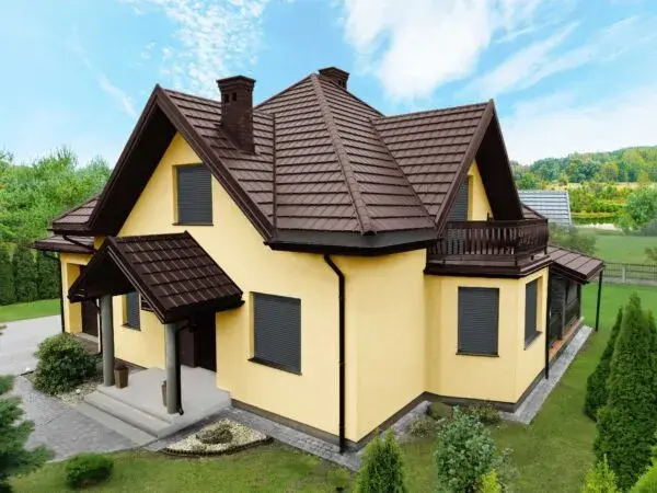 Idealne kolory elewacji do kasztanowego dachu - harmonia i styl