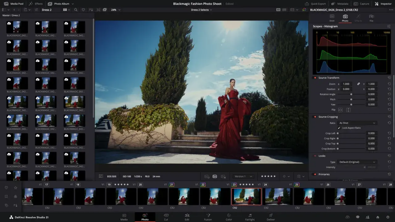 Kobieta w czerwonej sukni na schodach, edytowana w DaVinci Resolve free. Widok interfejsu programu z podglądem zdjęć i narzędziami.