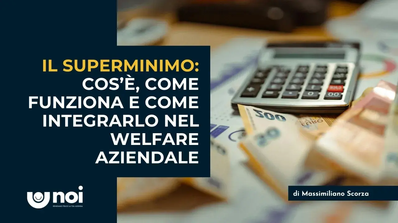 Il superminimo non assorbibile: cos'è, come funziona e come integrarlo nel welfare aziendale. Calcolatrice e banconote in primo piano.