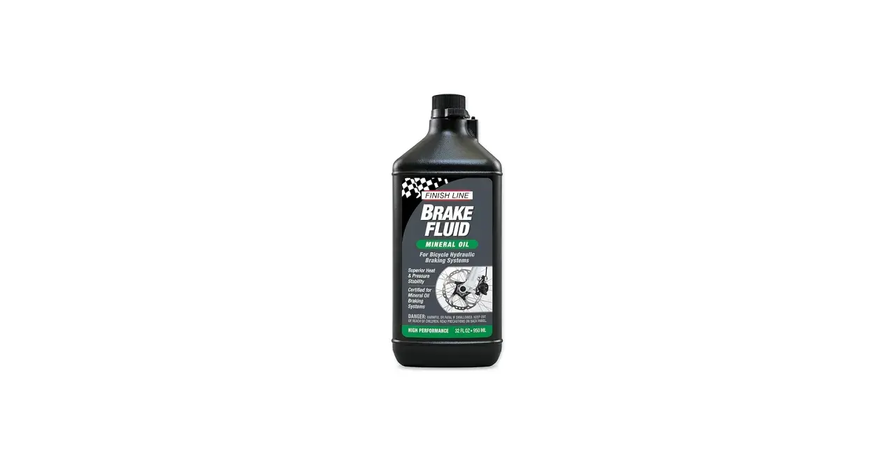 Finish Line Brake Fluid bottle, mineral oil for hydraulic systems. Its viscosity ensures superior heat and pressure stability for reliable braking.