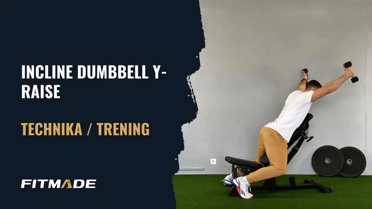 Mężczyzna wykonuje ćwiczenie incline dumbbell y-raise na ławce skośnej, podnosząc hantle w kształcie litery Y.