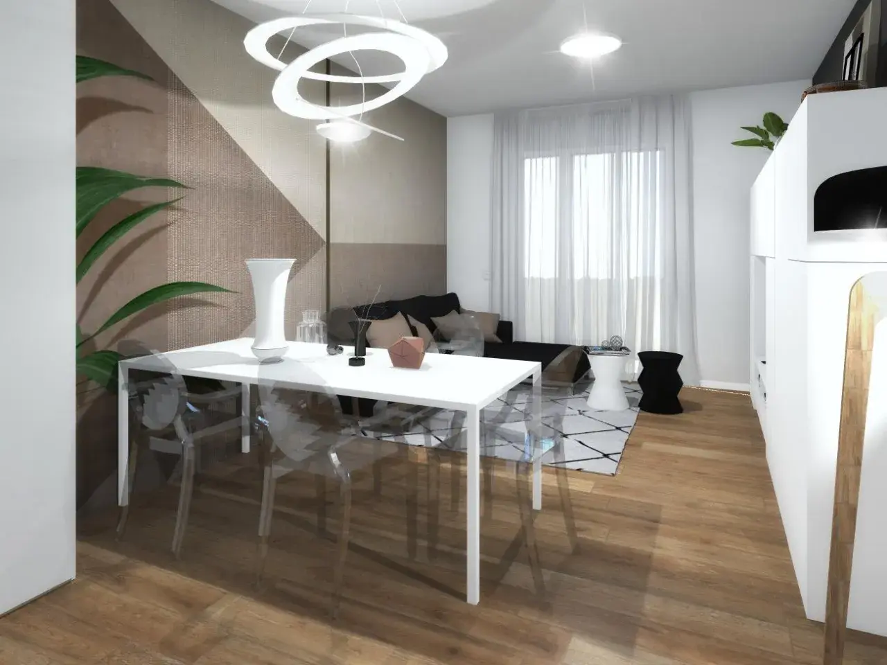 La parete dietro tavolo da pranzo presenta un motivo geometrico in tonalità neutre.