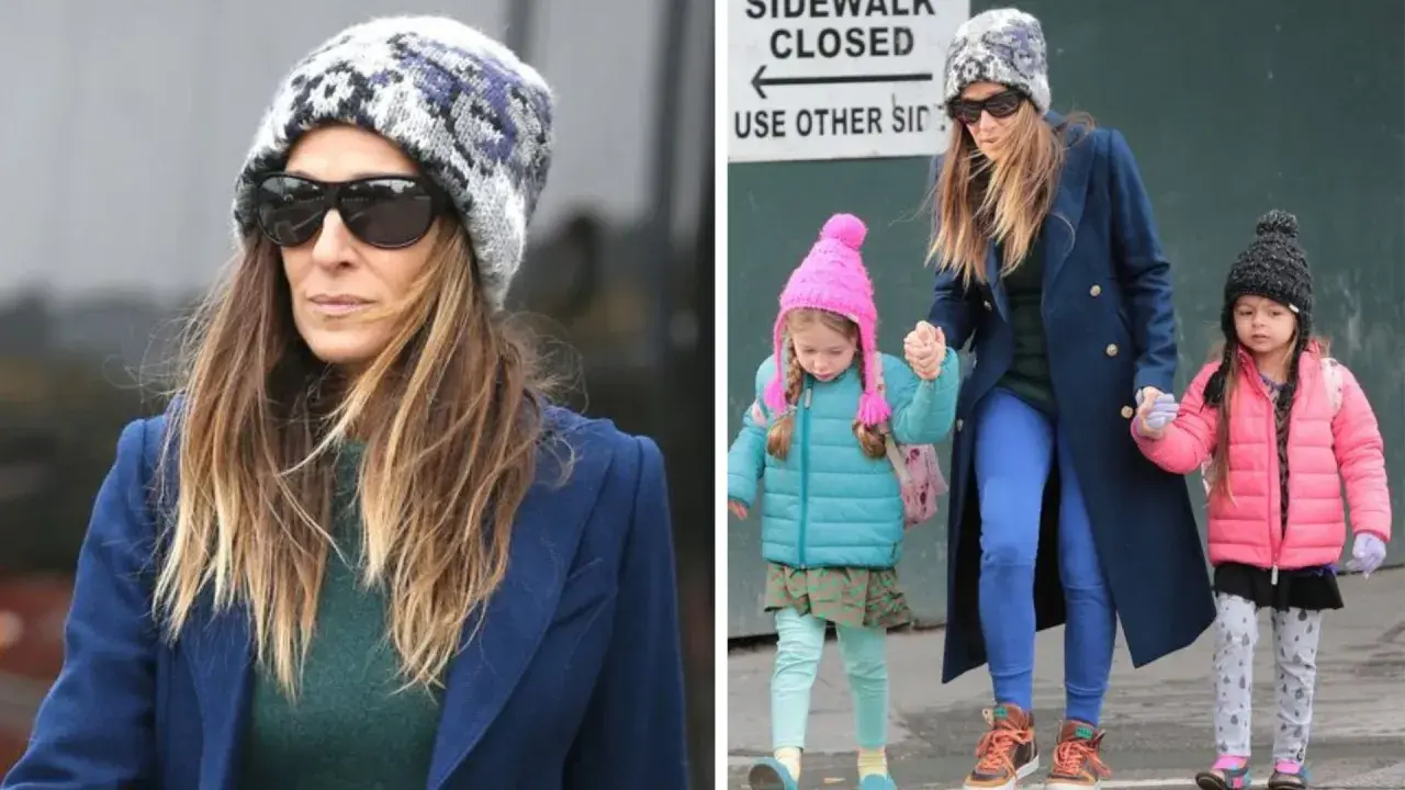 Sarah Jessica Parker z dziećmi, w zimowych czapkach i kurtkach, spaceruje po mieście.