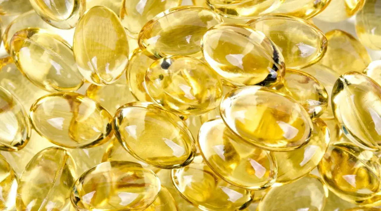 Gula kapslar med d-vitamin, som kan hjälpa mot depression.