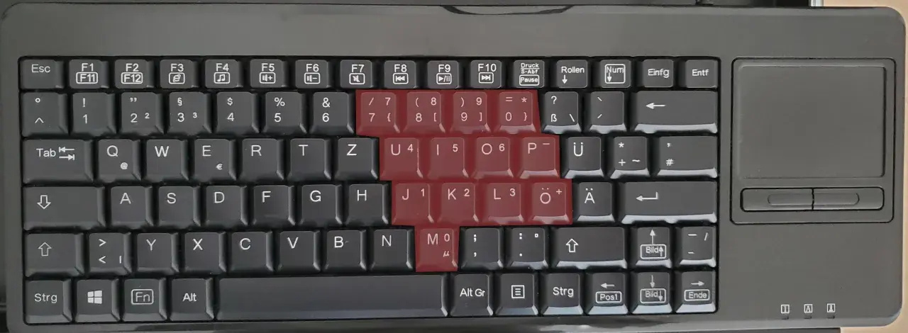 Die Tastatur zeigt, dass die Zahlenreihe und die Tasten mit den Zahlen 1-6 rot markiert sind. Die Tastatur zahlen gehen nicht.