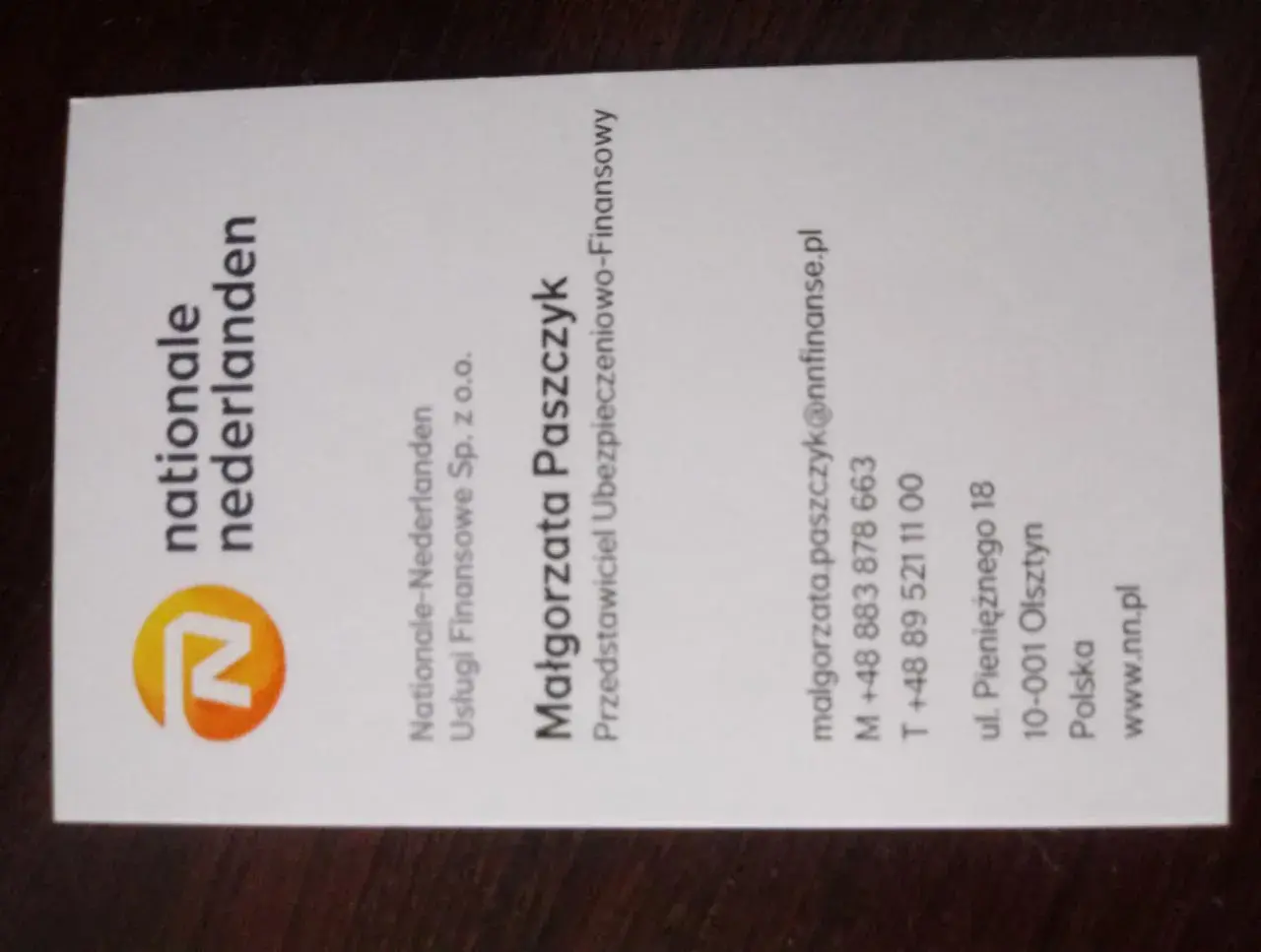 Wizytówka z logo Nationale-Nederlanden i danymi kontaktowymi Małgorzaty Paszczyk.
