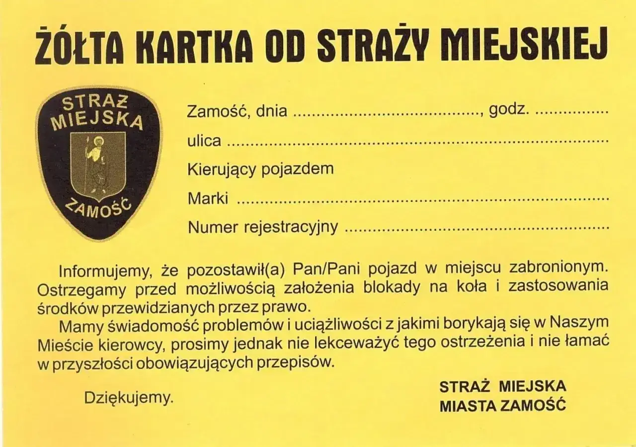 Żółta kartka od Straży Miejskiej Zamość. Czy straż miejska może dawać punkty karne? Nie, ale ostrzega przed blokadą koła.