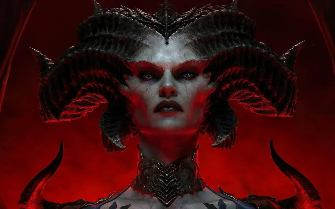 Lilith, z rogami i demonicznym obliczem, zapowiada nowy sezon Diablo 4. Czerwone tło podkreśla jej mroczną aurę.