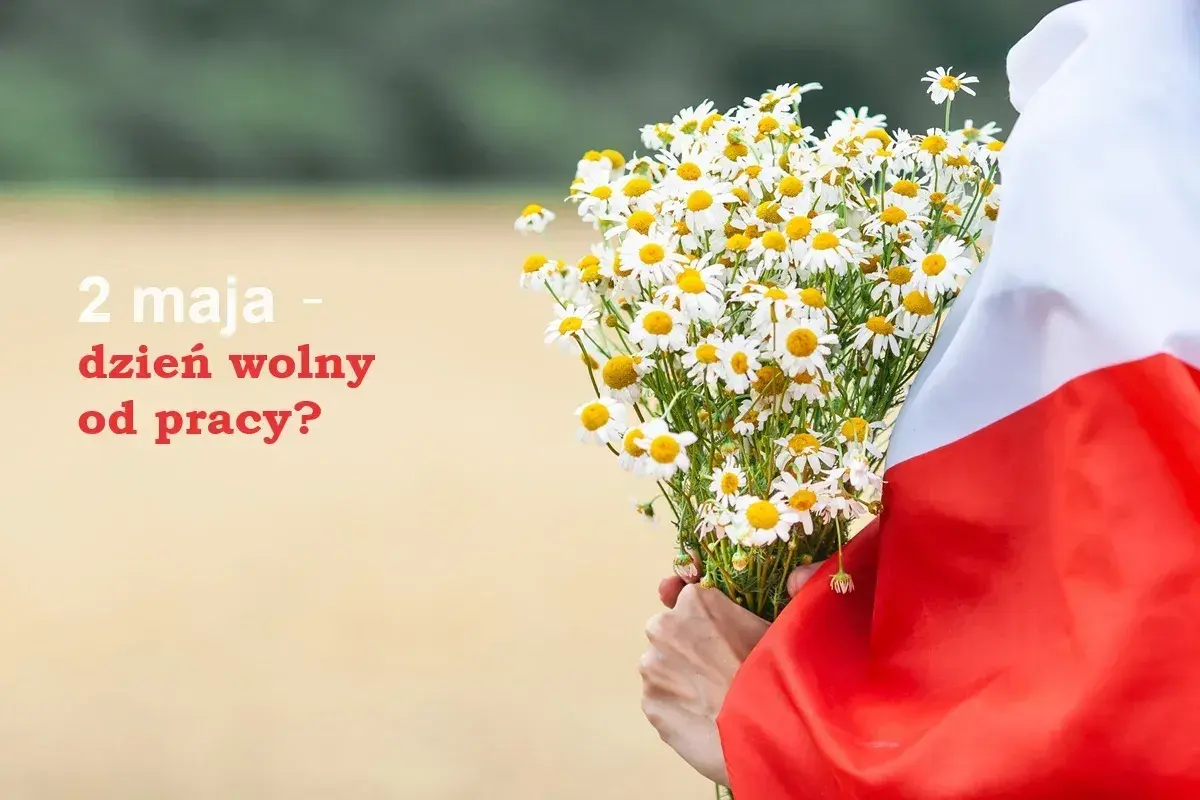 Bukiet polnych kwiatów i biało-czerwona flaga. Czy 2 maja jest dniem wolnym od pracy?