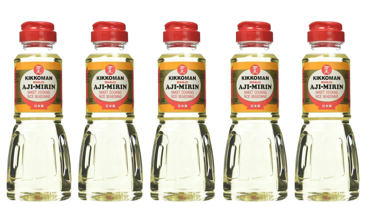 Five bottles of Kikkoman Aji-Mirin, a sweet cooking rice seasoning. Mirin is used to add sweetness and glaze to Japanese dishes.
