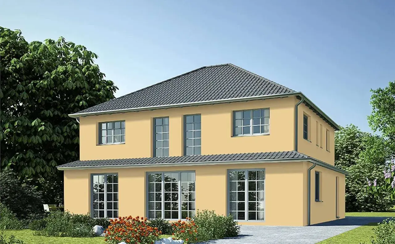 Sonnengelbe Hausfassade mit großen Fenstern, umgeben von Grün. Tolle Hausfassade Farbe Ideen für ein helles Zuhause.