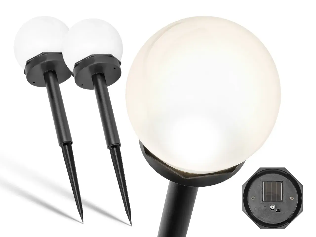 Dwie białe lampy solarne w kształcie kuli z czarnymi tyczkami. Na dole jednej z lamp widać panel solarny, który ładuje się od słońca, a nie od żarówki.