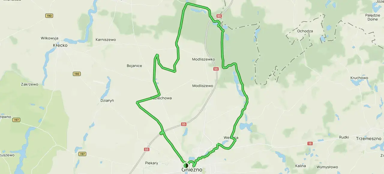 Mapa z zaznaczonymi trasami rowerowymi wokół Gniezna, prowadzącymi przez Kłecko, Modliszewko i inne malownicze miejscowości.
