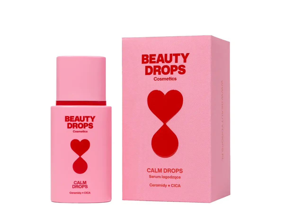 Różowe opakowanie i buteleczka serum Calm Drops z napisem "Ceramidy + CICA". Ceramidy na co? Na ukojenie i regenerację skóry.