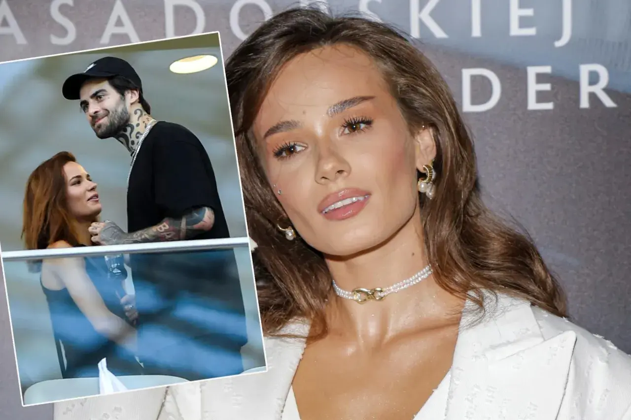 Natalia Szroeder z partnerem, uśmiechnięci i blisko siebie. W tle widać fragmenty napisu.