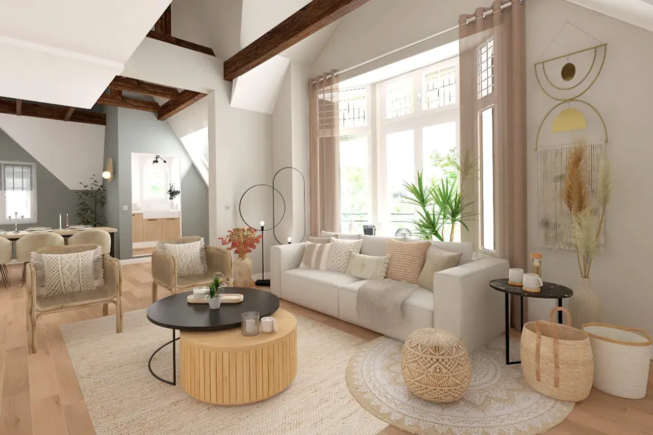 Un salon lumineux avec des poutres apparentes, un canapé blanc confortable, des fauteuils en rotin et une table basse en bois. La déco salon lumineux est complétée par des coussins texturés et des éléments naturels.