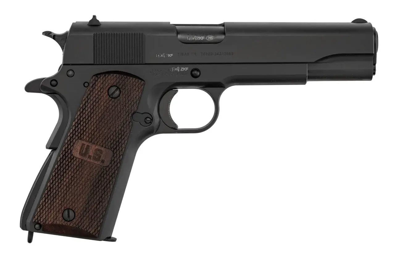 Pistolet noir avec poignées en bois gravées "U.S.". Le numéro de série 11 43 est visible sur la culasse.