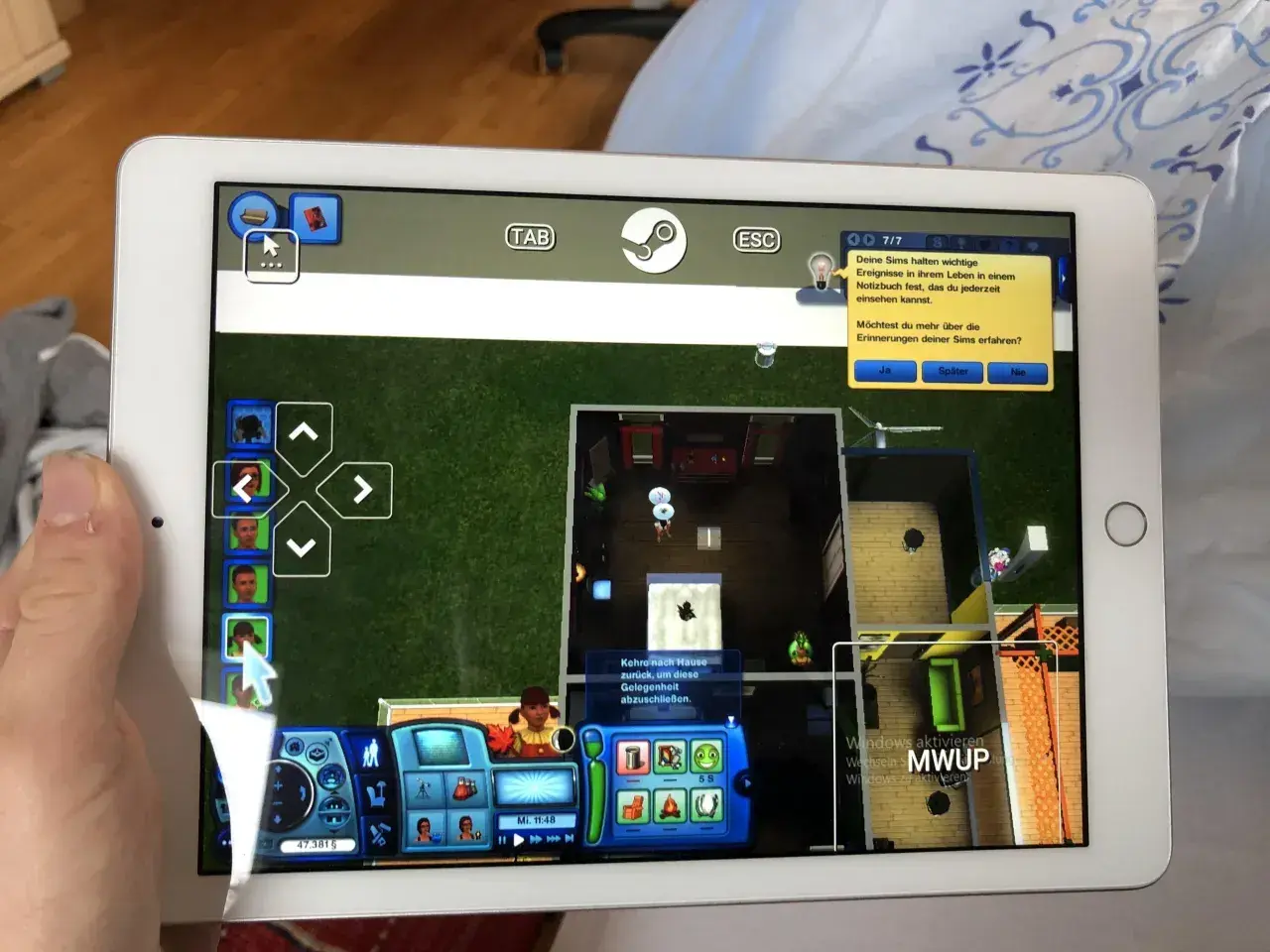 Gra w The Sims na telefonie przez Steam. Sterowanie na ekranie ułatwia grę, pokazując, jak grac w gry Steam na telefonie.