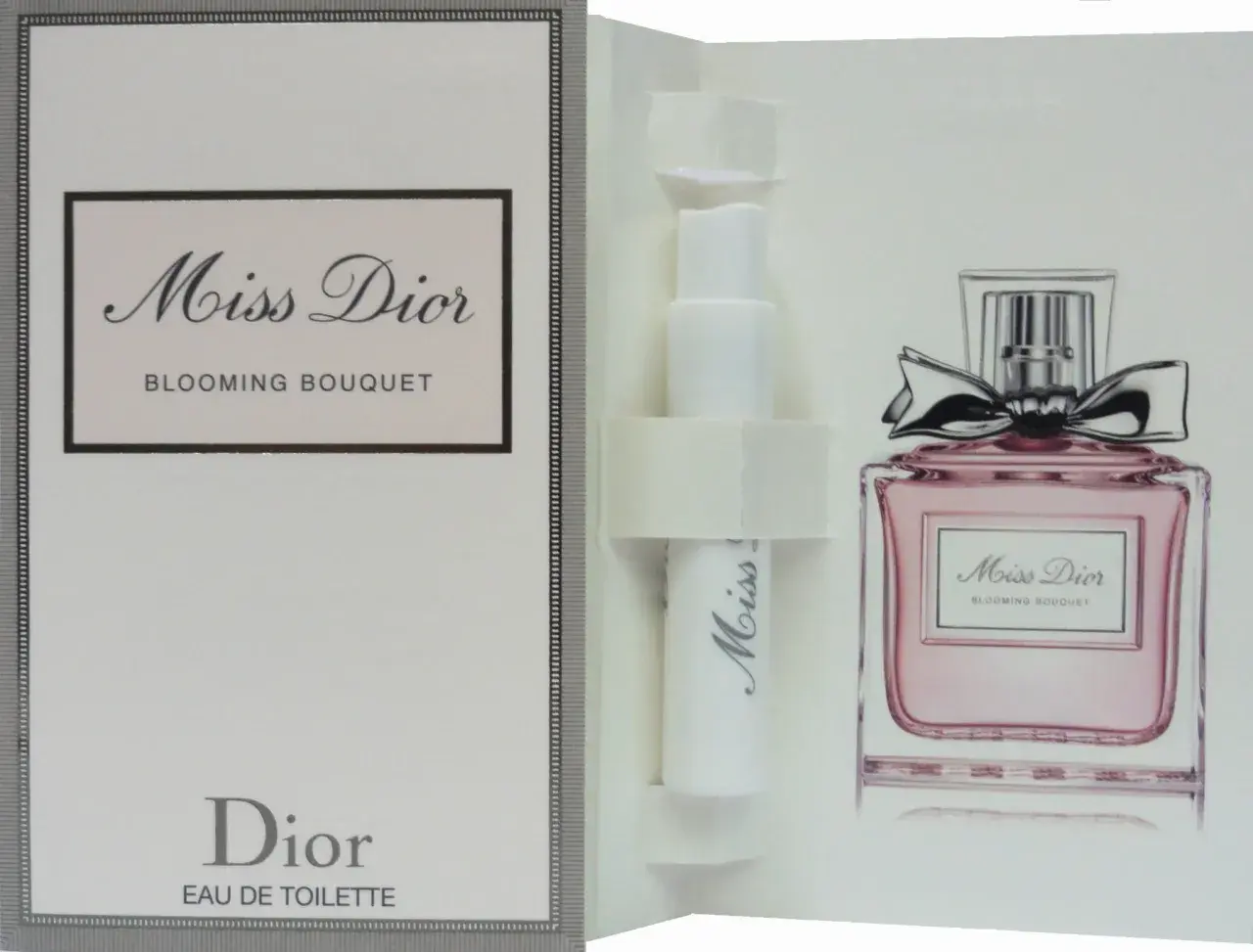 Karta z próbką perfum Miss Dior Blooming Bouquet. Różowa buteleczka z kokardką i nazwa zapachu.