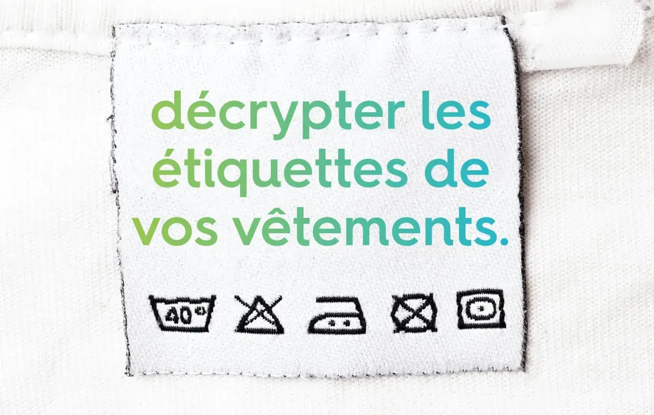 Étiquette de vêtement expliquant comment décrypter les symboles d'entretien.