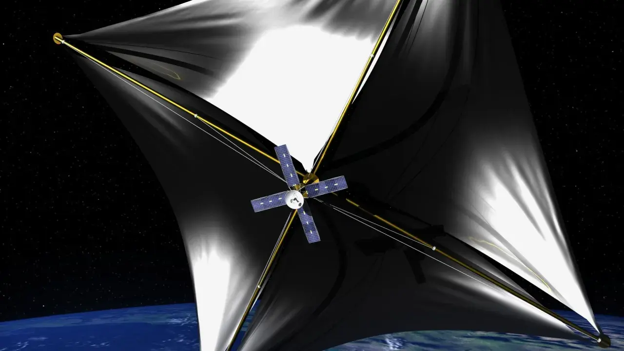 Statek kosmiczny z czarnymi żaglami, symbolizujący przełom w podróżach międzygwiezdnych, unosi się nad Ziemią. Breakthrough starshot.