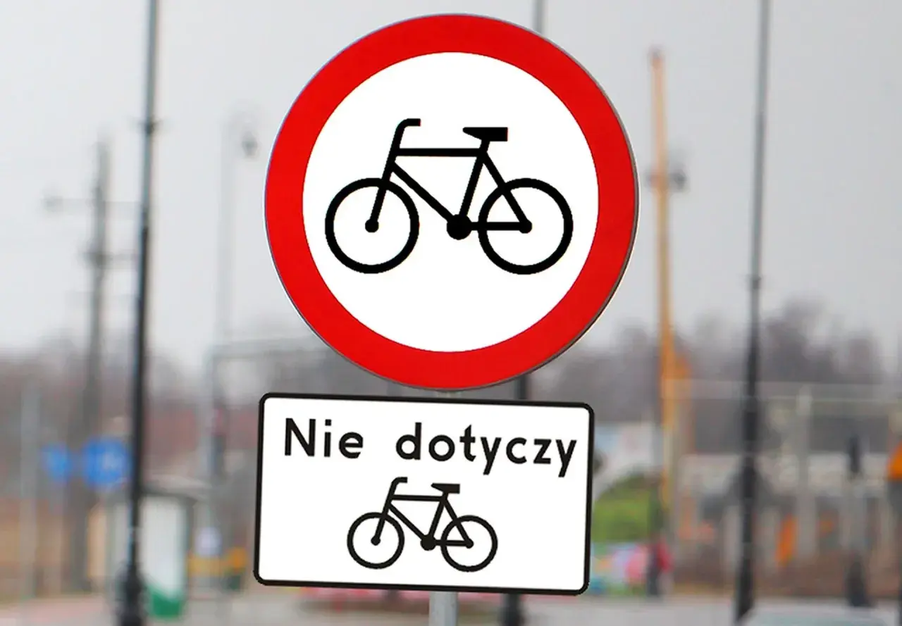 Dwa znaki drogowe: okrągły z rowerem i przekreślonym, oraz prostokątny z napisem "Nie dotyczy" i rowerem. Różne rodzaje znaków informują o zakazie ruchu rowerowego.