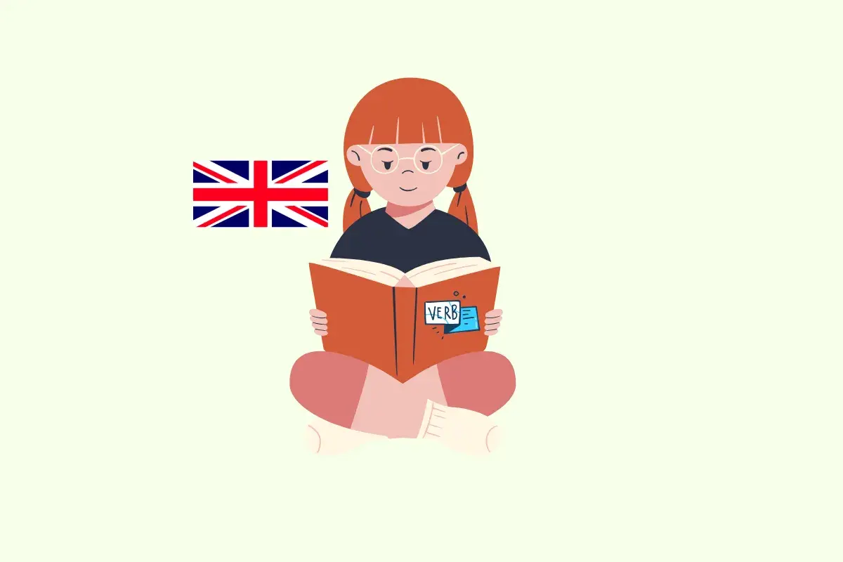 Niña con bandera británica lee un libro sobre verbos regulares.