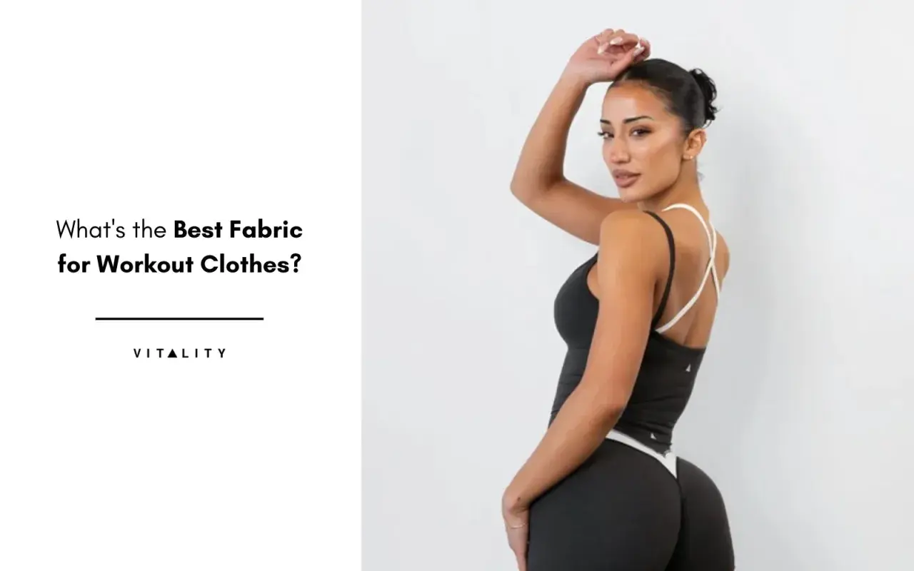A woman models workout clothes, highlighting the importance of the right sports clothing material for comfort and performance.